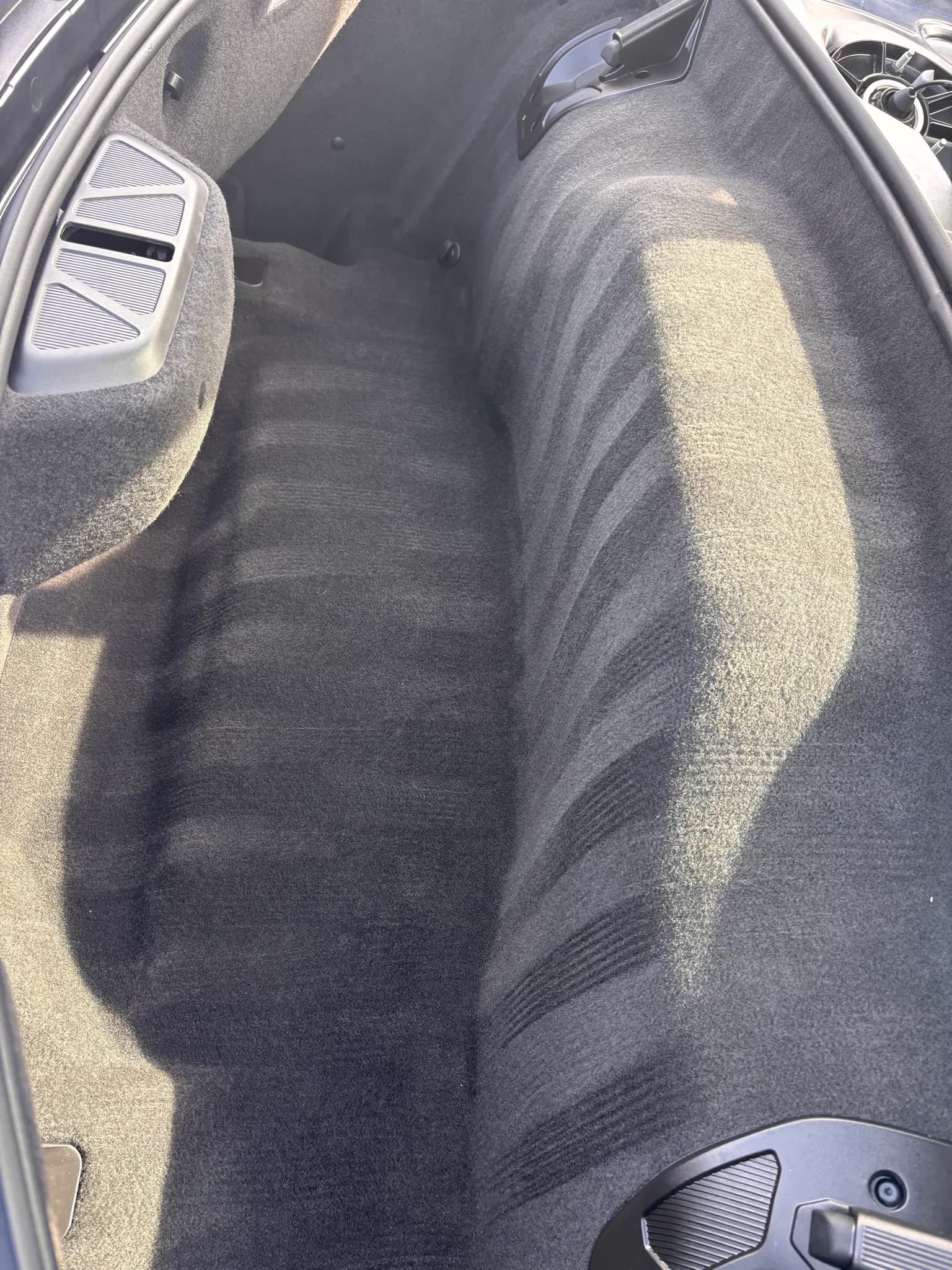Vacuumed front trunk carpet inside a Chevrolet Corvette C8 Z06.